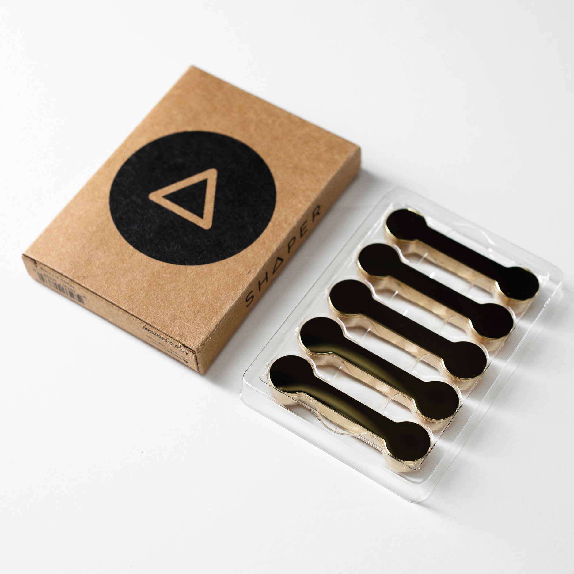 product: Shaper Brass Barbells Inlays - 5 Pack shown
