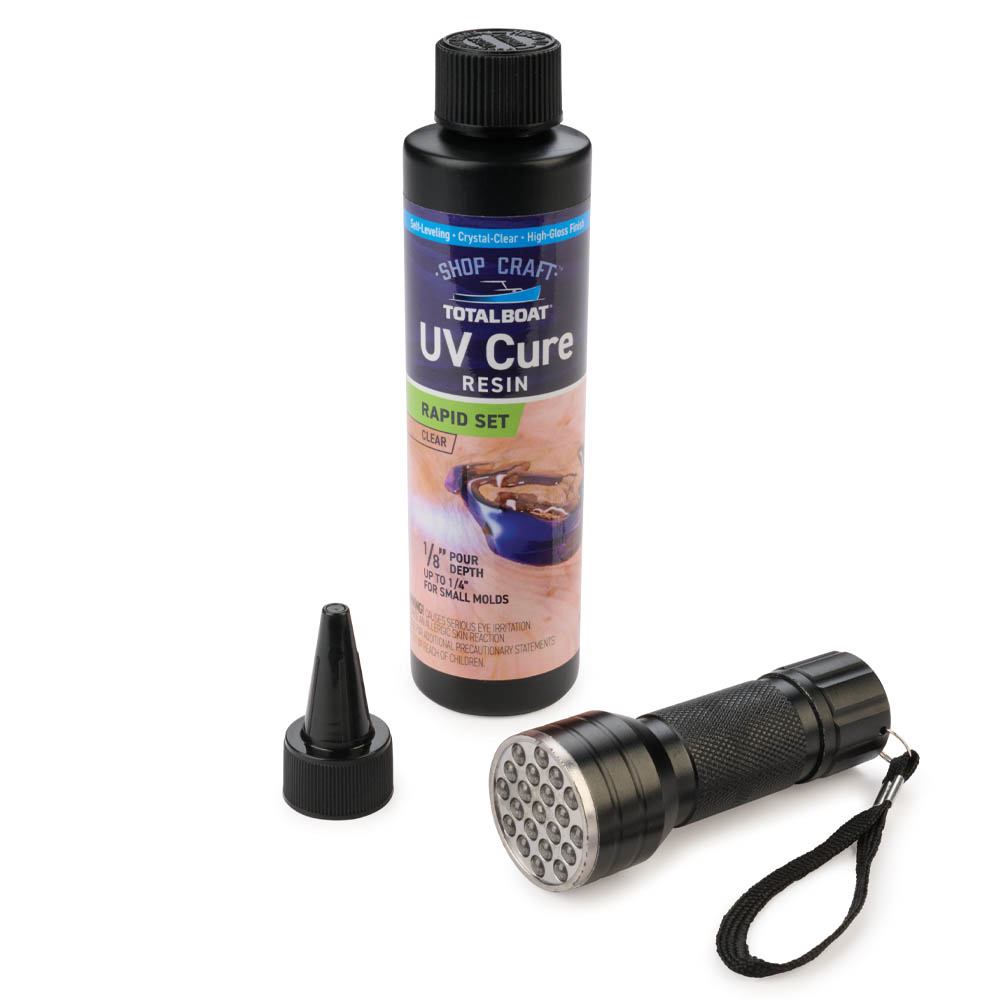 product: TotalBoat UV Cure Resin Kit with UV Flashlight - Clear - 7 oz shown